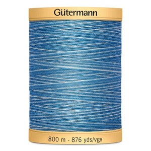 May include: A spool of Gütermann thread in a blue and white colourway. The spool is labelled with the brand name and the length of the thread: 800 m - 876 yds/vgs.