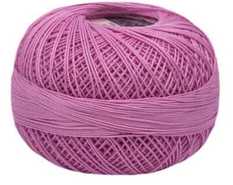 May include: A ball of pink yarn, ready for knitting or crocheting.