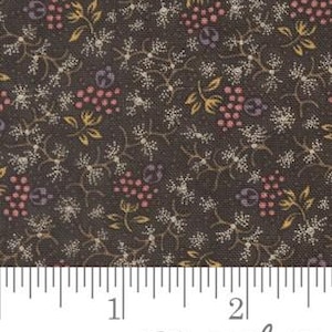 May include: Dark brown fabric with a repeating floral pattern. The design includes small clusters of pink and purple berries, yellow leaves, and white flowers. A ruler is at the bottom, with the word "moda" in script.