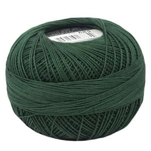 May include: A ball of dark green yarn.