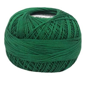 May include: A ball of green yarn.