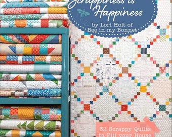 Scrappiness is Happiness de Lori Holt de Bee in My Bonnet, libro de tapa blanda con 32 patrones de colchas hechas con retazos.