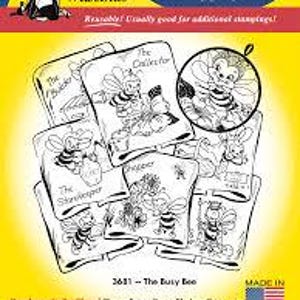 May include: Aunt Martha's iron-on transfers with designs for embroidery, fabric painting, quilting, and stamping. The image displays several transfer sheets with bee illustrations, including the text "The Collector" and "The Busy Bee".