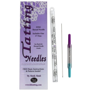May include: A clear plastic tube containing a silver tatting needle. The tube has a purple and blue cap and a label that reads "Tatting Needles" and "Handy Hands".
