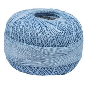 May include: A ball of light blue yarn.
