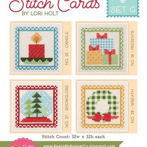 May include: A set of four cross-stitch cards featuring holiday-themed designs. The cards include a candle, presents, a snow globe, and a wreath. The text "BEE IN MY BONNET Stitch Cards" is at the top. Each design is 32 stitches wide by 32 stitches high.