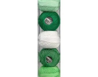 May include: A set of five balls of yarn in shades of green and white. The yarn is arranged in a clear plastic container. The label on the container reads "Lizbeth".