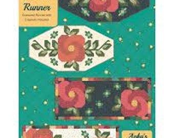 Rose Garden Table Runner Pattern by Heather Peterson of Anka's Treasures . 30" x 59" and 29" x 62.75" oversized runners