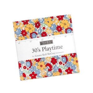 May include: A stack of fabric squares with a floral pattern in red, yellow, and blue. The fabric is labeled "30's Playtime" by Linzee Kull McCray. The squares are held together with a white band that has measurement markings.