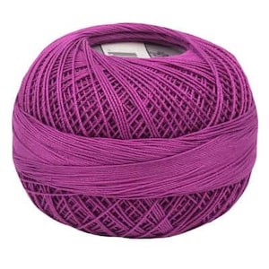 May include: A ball of deep purple yarn.