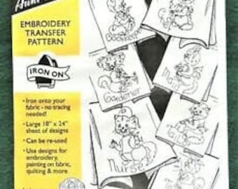 May include: Iron-on embroidery transfer pattern sheet with a design of a cat for each day of the week. The sheet is 10" x 24" and can be re-used.  Aunt Martha's #3975 Cat of all Trades.
