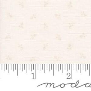 May include: White fabric with a subtle, repeating pattern of small, light gray floral sprigs.