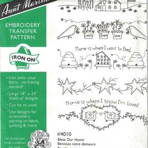 May include: Iron-on embroidery transfer pattern sheet with designs for home decor. The sheet includes designs for beehives, houses, stars, and a heart with sheep. The sheet is 18 inches by 24 inches and can be re-used. The text on the sheet reads "Love begins at home", "Home is where I want to Bee!" and "Home is where I know I'm Loved".