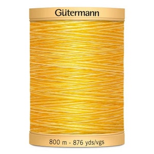 May include: A spool of Gütermann sewing thread in a bright yellow color. The spool is labeled with the brand name and the length of the thread: 800 m - 876 yds/vgs.