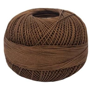 May include: A ball of brown yarn, wound into a round shape.