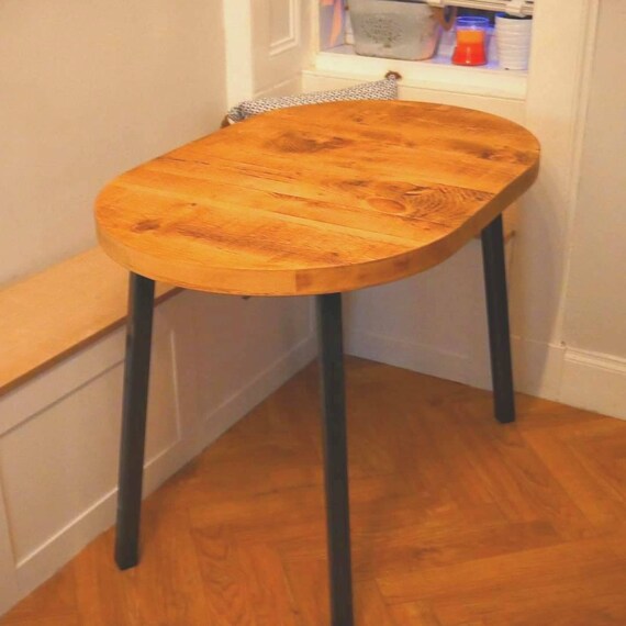 Rustic round extendable dining table deals