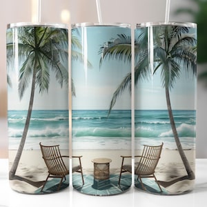 May include: A stainless steel tumbler with a tropical beach scene. The design features a sandy beach, turquoise ocean, palm trees, and two wicker chairs with a small table. The tumbler has a clear lid and a straw.