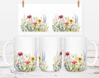 May include: Three white ceramic mugs with a floral design. The design features a variety of flowers in shades of pink, yellow, and blue, with green leaves and stems. The flowers are arranged in a horizontal band around the mug.