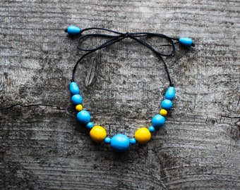 Blue and yellow short necklace for women. Wooden bead necklace.