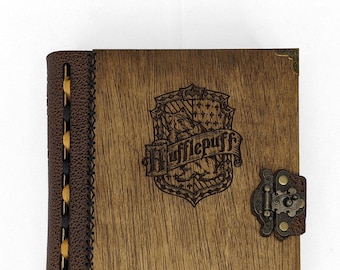 Liber Consocia, a tabletop companion book and handcrafted game box (stock - Hufflepuff themed with gold+black binding/lining)