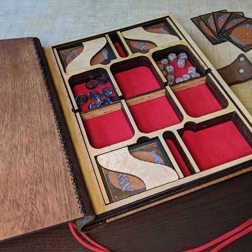 Magna Liber Consocia, a larger tabletop companion shops book and handcrafted game box (stock - red cord with red lining)
