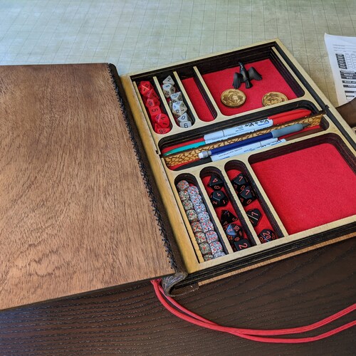 Magna Liber Consocia, a larger tabletop companion shops book and handcrafted game box (stock - red cord with red lining)