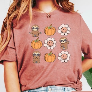 Sloth Groovy Fall Graphic Tee, Sloth Floral Pumpkins T Shirt, Cute Sloth Halloween Top, Spooky Season Top, Womens Halloween Tee