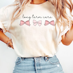 Comfort Colors® Long Term Care Nurse, Coquette Pink Bows Nurse Tee, LTC Nurse Shirt, Long-Term Care Nurse Tee, Gift for LTC Nurse, ICU Nurse