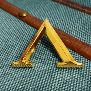 Atlantis lapel pin