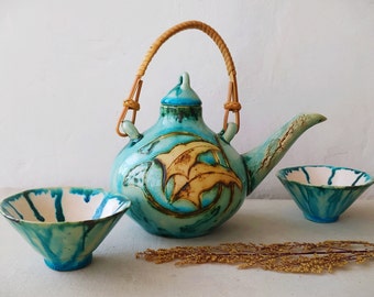 Ceramic teapot with two cups. Turquoise tea set. Author's tableware.