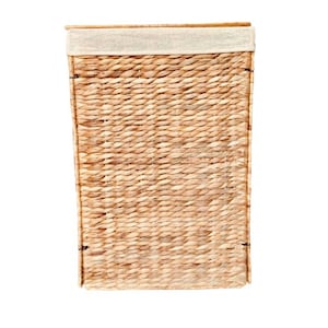 May include: A natural woven storage basket with a white fabric lining. The basket is made of natural materials and has a rectangular shape.