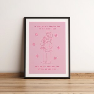 May include: A pink framed print with a cartoon character and the text "IF YOU CAN'T HANDLE ME AT MY DIDOLIEST YOU DON'T DESERVE ME AT MY DOODLIEST".