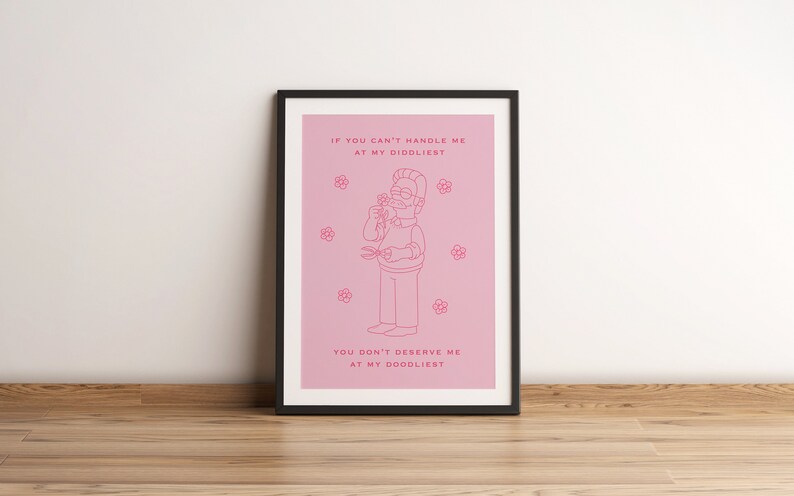 May include: A pink framed print with a cartoon character and the text "IF YOU CAN'T HANDLE ME AT MY DIDOLIEST YOU DON'T DESERVE ME AT MY DOODLIEST".