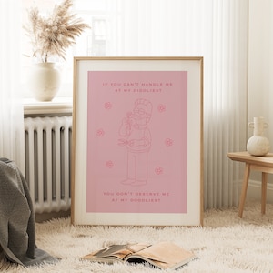 May include: A pink and white printable wall art print with a cartoon character and the text "If you can't handle me at my diddliest, you don't deserve me at my doodliest."