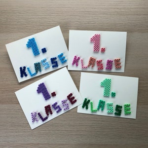 Karte zur Einschulung/Schulbeginn aus Bügelperlen in verschiedenen Farben