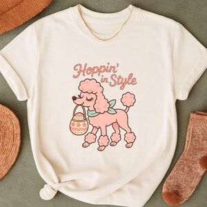 Hoppin’ In Style PNG, Cute Pink Poodle Easter T-Shirt Design, Fashion Dog Sublimation Art, Spring Pastel Retro Cartoon Bunny Basket PNG