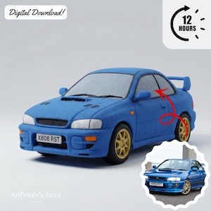 May include: A blue car with gold wheels and a rear spoiler. The car has a license plate that reads "X808 RST". The image also includes the text "Digital Download!" and "12 HOURS".
