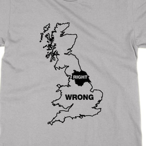 May include: A gray t-shirt with a black outline of the United Kingdom. The text "RIGHT" is inside the outline of England and the text "WRONG" is below the outline of England.