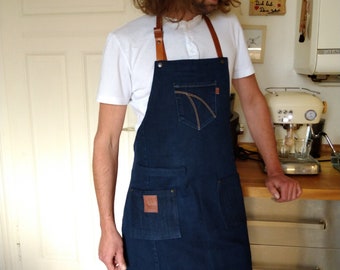 Cooking apron/barbecue apron made of dark blue denim with removable leather straps