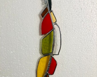 Feather of the Earth Stained Glass Suncatcher - Handcrafted stained glass feather window hanging