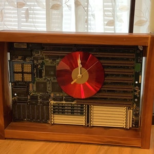 Computer clock, recycled computer motherboard sculpture. Cedar wood desk clock for geeks with red cd face.  Art clock from recycled computer