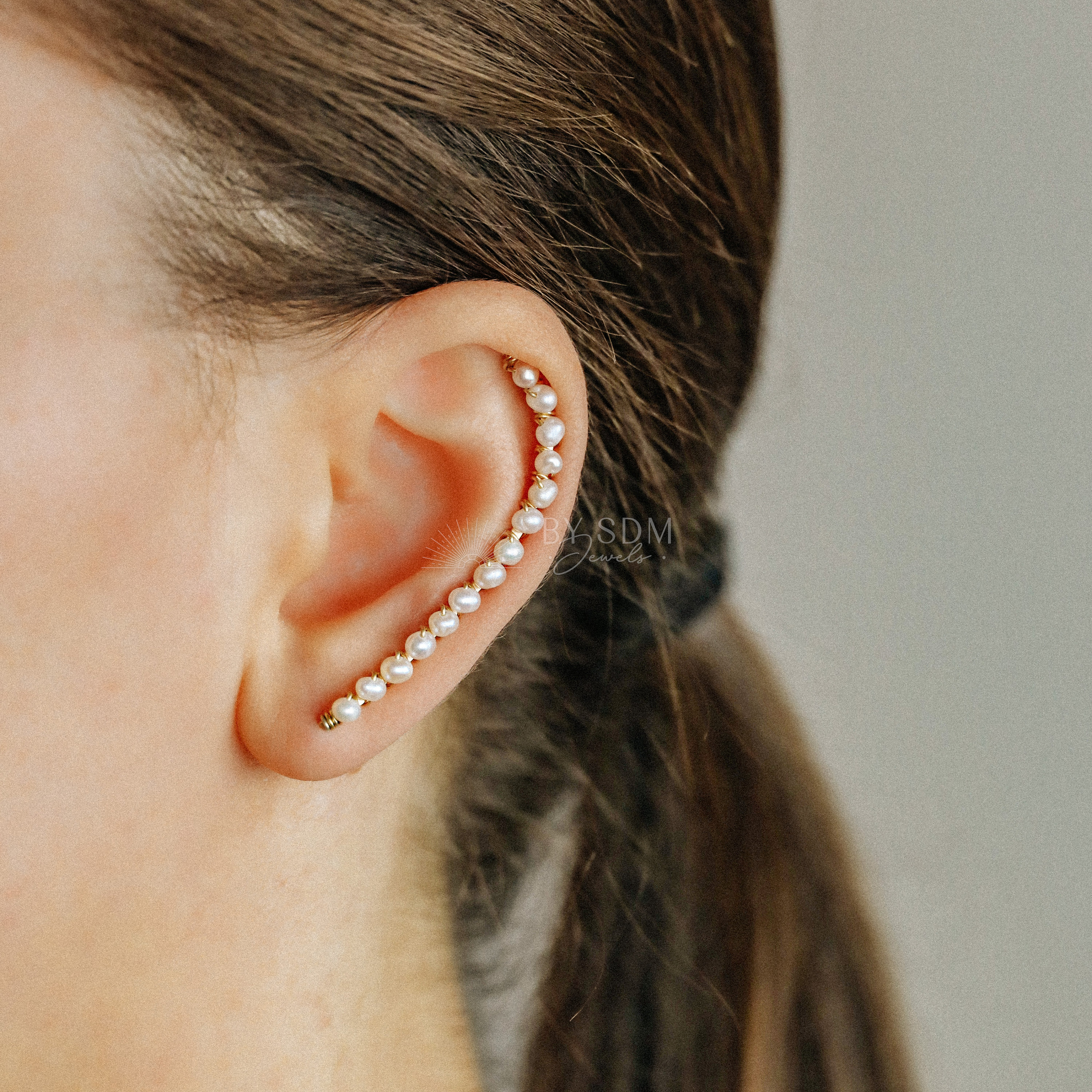 Pearl ear crawler outlet