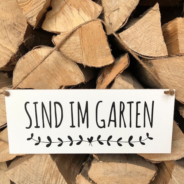 Schild Sind im Garten