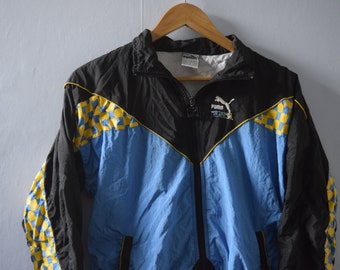 blue and white puma tracksuit