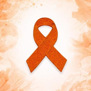 May include: An orange ribbon patch with a textured surface, set against a watercolour-style background in shades of orange and white. The ribbon is a symbol of awareness and support.