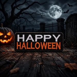 May include: A rectangular patch with the words "HAPPY HALLOWEEN" in white and orange embroidery. The patch is set against a spooky Halloween scene with a carved pumpkin, full moon, and graveyard.