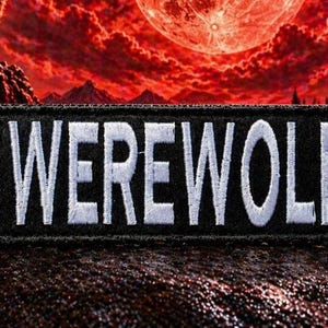 May include: A black patch with the word "WEREWOLF" embroidered in white. The patch is set against a backdrop of a red sky, a full moon, and a wolf standing on a rocky hill.