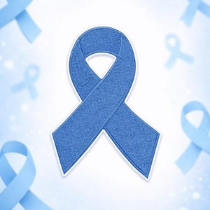 May include: A light blue ribbon patch with a white border, surrounded by several other light blue ribbons on a white background. The ribbons are a symbol of awareness.