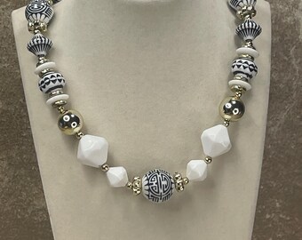 Vintage acrylic blue and white, single strand oriental pattern beaded necklace, 24"