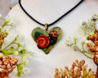 Floral Heart Pendant Necklace, Antique Faux Marble Heart with a Red Rose and a ladybug on a Faux Leather Black Chord